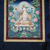 Nice tangka painted on textile in mineral and golden paints with White Tara image